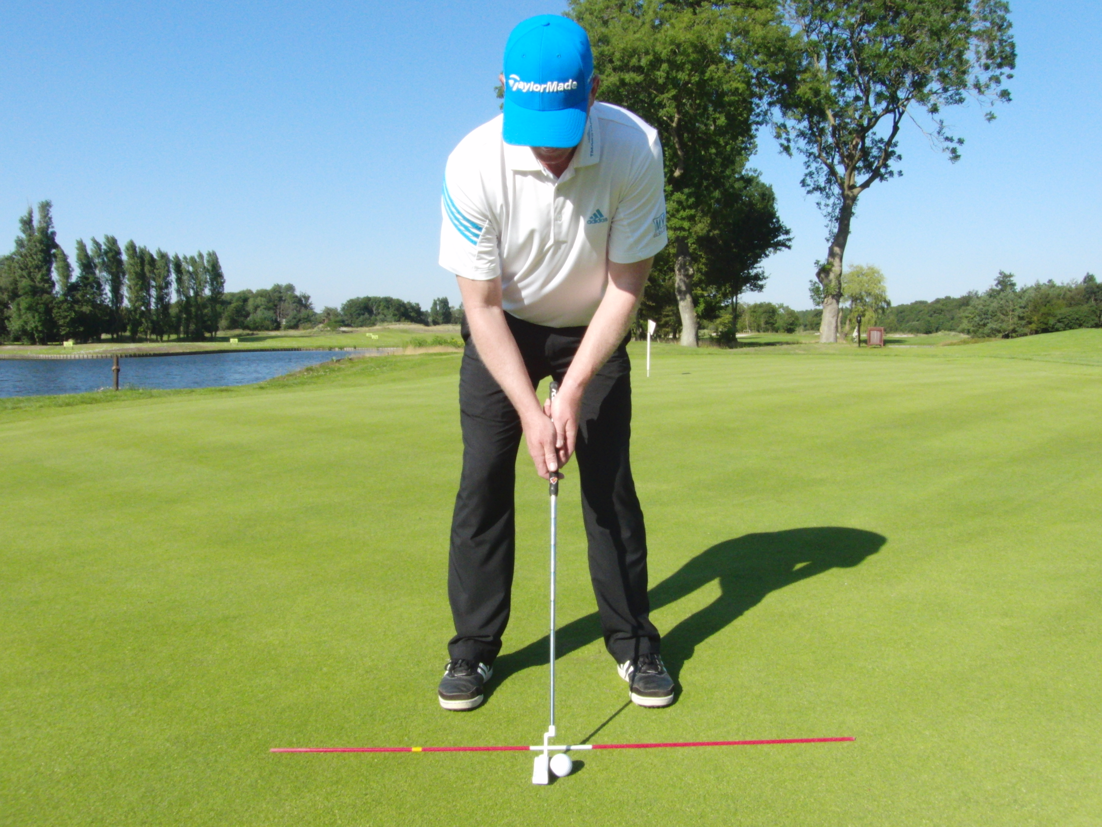 Deze methode geeft ook de juiste hoogte van je grip aan.